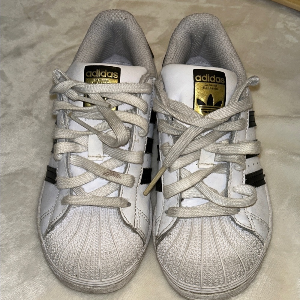 Adidas White & Black Superstar Sneakers with Gold Logo